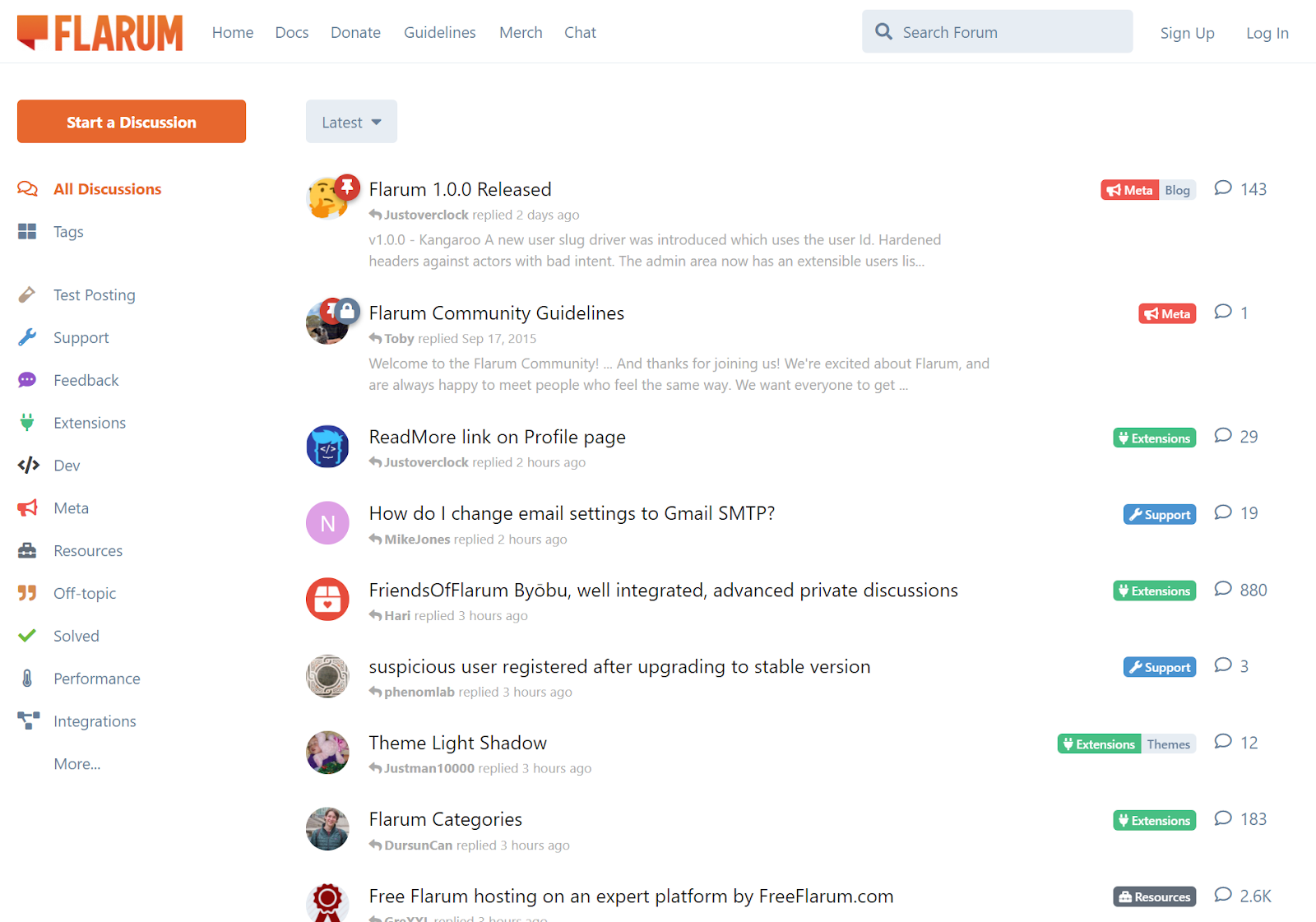 ```json
{
  "alt": "Screenshot of Flarum forum with topics listed and navigation menu on the left.",
  "caption": "Dive into the Flarum community! Explore latest discussions, guidelines, and tips shared by users in this interactive forum interface.",
  "description": "This image shows a screenshot of the Flarum forum interface. On the left, there's a navigation menu with options like 'Tags', 'Support', and 'Extensions'. The main area displays discussions such as 'Flarum 1.0.0 Released' and 'Flarum Community Guidelines' with reply counts and categories marked by colored tags like 'Meta' and 'Extensions'. The header includes links to 'Home', 'Docs', and a search bar, reflecting an organized layout for community interaction."
}
```