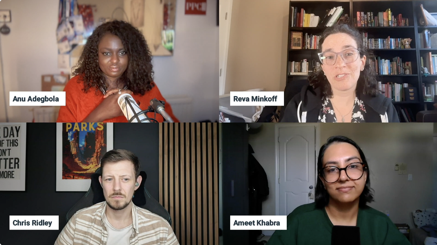 ```json
{
  "alt": "Four people in a virtual meeting, each in their separate quadrant.",
  "caption": "A virtual meeting with four participants discussing ideas, each in their unique setting, showcasing a blend of professional engagement and personal style.",
  "description": "This image captures a virtual meeting with four individuals, each appearing in separate quadrants. Top left is a person with a microphone, wearing a red shirt. Top right, another participant speaks in front of a bookcase. Bottom left, a person sits against a dark wall with posters, focused on the conversation. Bottom right, a participant with glasses and a green top is speaking. The image highlights diverse home office settings and professional engagement in a digital conference context."
}
```