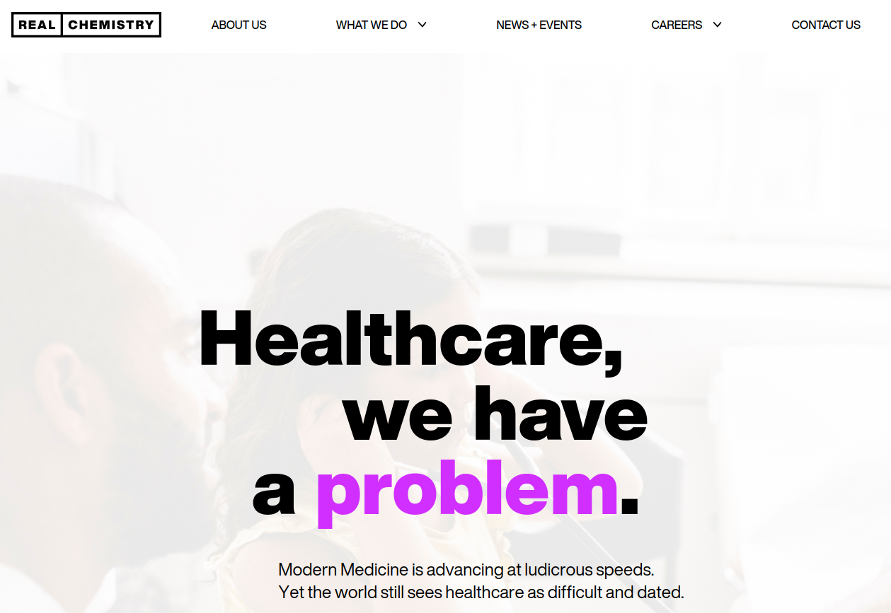 ```json
{
  "alt": "Website header with bold text: Healthcare, we have a problem. Real Chemistry navigation menu on top.",
  "caption": "Navigating the healthcare challenge: 'Healthcare, we have a problem,' as highlighted by Real Chemistry's bold statement.",
  "description": "This image is a screenshot of Real Chemistry's website header featuring a bold statement: 'Healthcare, we have a problem.' The text is in black and purple against a muted background image of a conversation. The navigation menu includes options like About Us, What We Do, News + Events, and Contact Us, emphasizing modern healthcare issues and Real Chemistry's approach to addressing them."
}
```