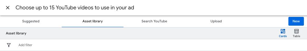 ```json
{
  "alt": "Interface for selecting up to 15 YouTube videos for an ad campaign, showing tabs for Suggested, Asset library, Search YouTube, and Upload.",
  "caption": "Easily curate up to 15 YouTube videos for your next ad campaign. Navigate through options with a streamlined interface for effective content selection.",
  "description": "This image shows a user interface for selecting YouTube videos to use in an advertisement. The interface features tabs including Suggested, Asset library (highlighted), Search YouTube, and Upload. Options for viewing content in 'Cards' or 'Table' format are available. A 'New' button allows for adding new content, while a filter option can refine selections. Ideal for digital marketers and SEO professionals managing video ad campaigns."
}
```