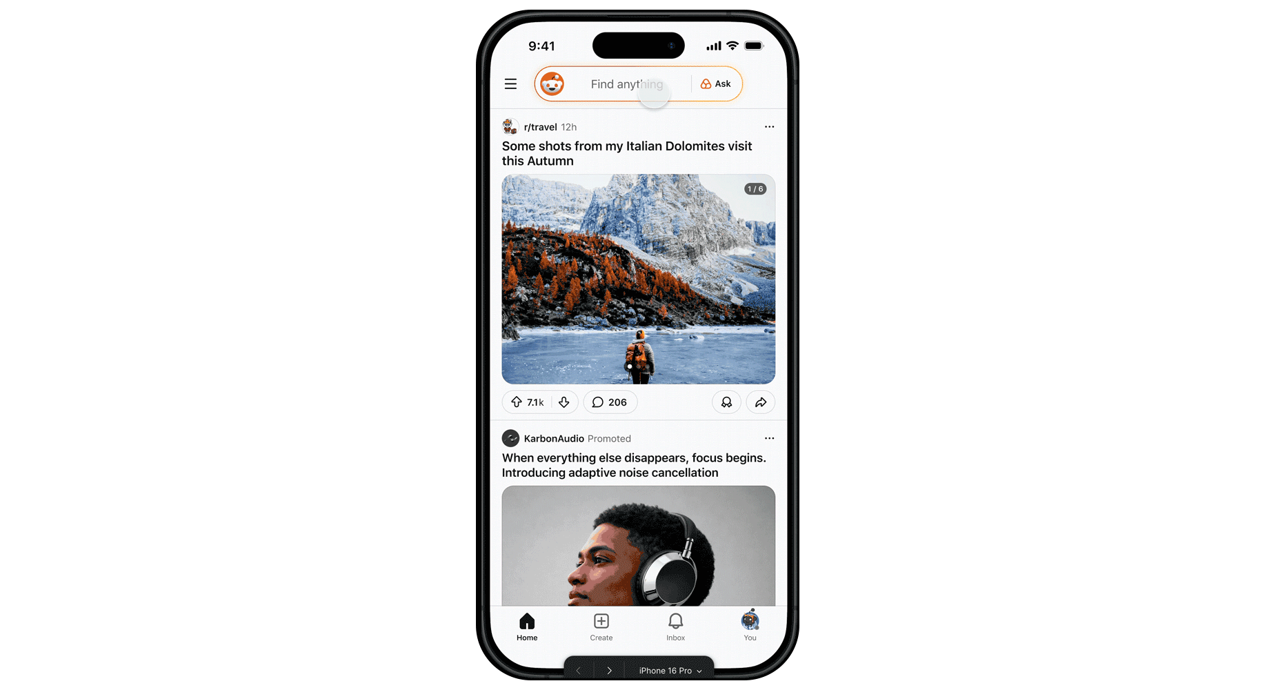 ```json
{
  "alt": "Smartphone display showing a Reddit app post of a person in front of snowy mountains.",
  "caption": "Explore stunning vistas through the lens of a traveler! Dive into breathtaking shots of the Italian Dolomites as shared on Reddit.",
  "description": "The image shows a smartphone screen displaying a Reddit app interface. A highlighted post from the travel subreddit features a photograph of a person standing in front of a landscape with vibrant autumn foliage and majestic snowy mountains, identified as the Italian Dolomites. The post has 7.1k upvotes and 206 comments, showcasing significant engagement. Below, a promoted ad for noise-cancelling headphones is visible. The interface also displays elements like search bar and navigation icons, illustrating typical usage of a social media app."
}
```