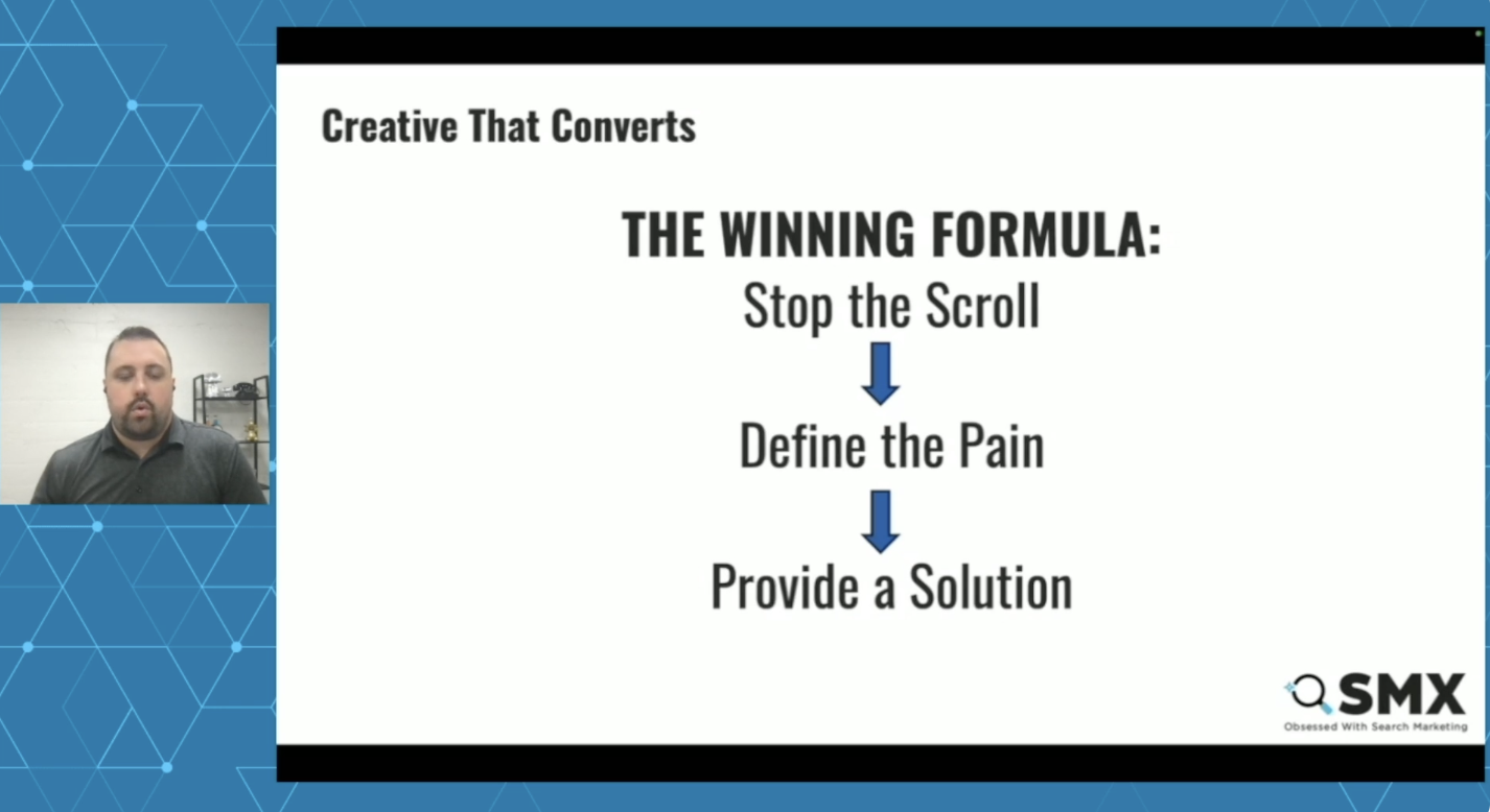 ```json
{
  "alt": "Split screen with a speaker on the left and a marketing formula on the right, titled 'The Winning Formula.'",
  "caption": "Discover the winning marketing strategy: Stop the scroll, define the pain, and provide a solution.",
  "description": "This image features a split screen layout, with a speaker on the left and a marketing strategy formula on the right. The formula, titled 'The Winning Formula,' includes the steps: Stop the Scroll, Define the Pain, and Provide a Solution. The image is part of a presentation by SMX, recognizable by its branding on the bottom right. The blue geometric background adds a professional touch to the composition."
}
```