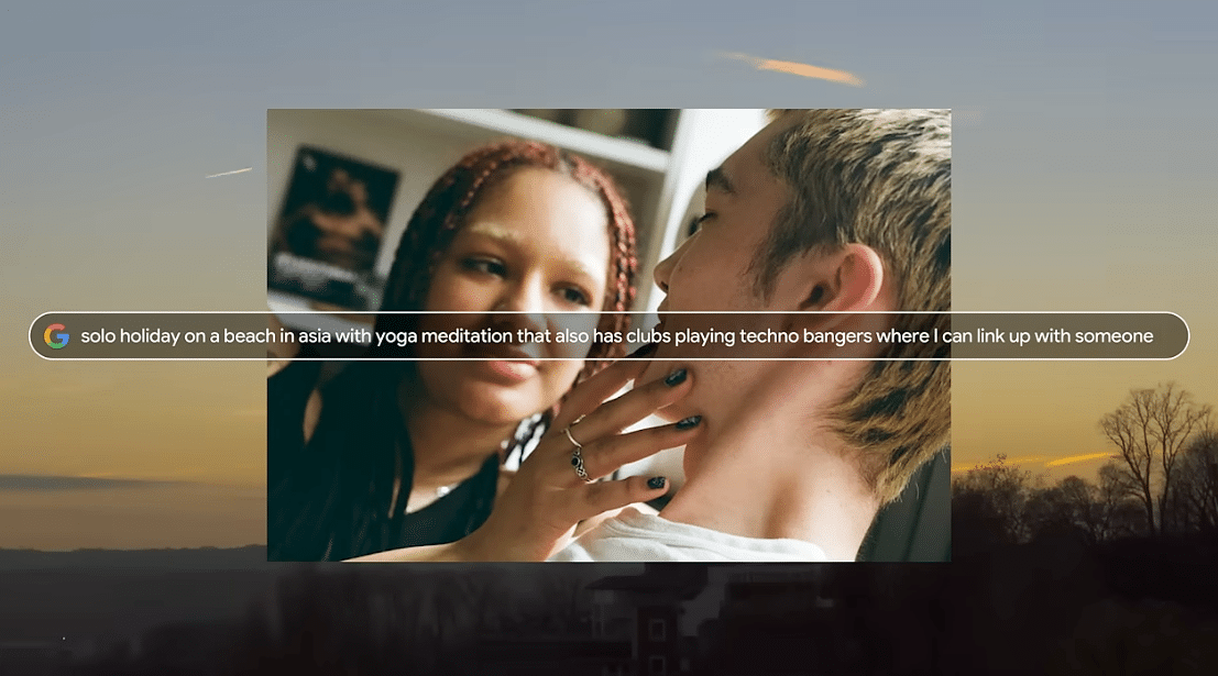 ```json
{
  "alt": "Two people intimately close, one touching the other's face, overlaid with a search query on a sunset backdrop.",
  "caption": "A moment of intimate connection as one person gently touches another's face, set against the backdrop of dreams of adventure and techno beats.",
  "description": "The image features two individuals in a close, intimate pose, with one gently holding the other's face. Overlaid is a search query about a solo holiday in Asia, yoga meditation, and techno clubs, suggesting a desire for adventure and connection. The background is a serene sunset, enhancing the theme of longing and exploration."
}
```