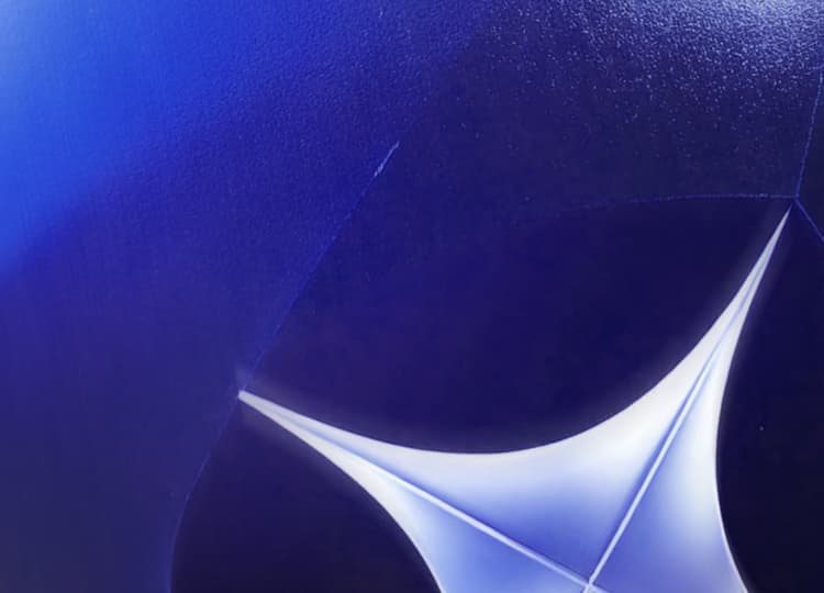 ```json
{
"alt": "Abstract image with a deep blue curved surface intersected by white geometric shapes.",
"caption": "Dive into the depths of blue with this stunning abstract art piece, where curves and geometric shapes create a mesmerizing interplay of light and color.",
"description": "This abstract image features a deep blue background with smooth curves intersected by sharp, white geometric shapes. The lighting creates a glossy texture, emphasizing the contrast between the blue and white elements. Ideal for modern art collections or design projects, it captures a sense of movement and depth. Keywords: abstract art, blue background, geometric shapes, modern design."
}
```