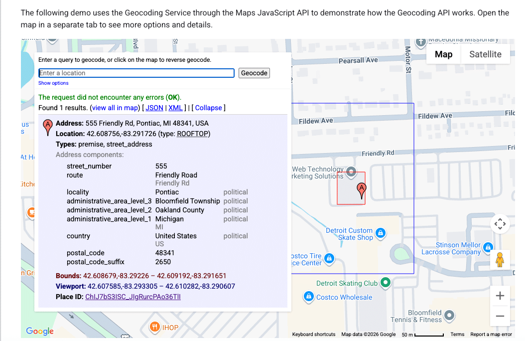 ```json
{
"alt": "Geocoding service demo using Maps JavaScript API with address details and location on map.",
"caption": "Explore the Maps JavaScript API with this geocoding demo, showcasing address details for 555 Friendly Rd, Pontiac, MI.",
"description": "This image displays a geocoding service demo using the Maps JavaScript API. It highlights the detailed address of 555 Friendly Rd, Pontiac, MI 48341, USA. The interface shows the address components, coordinates (42.608756, -83.291726), and a map section indicating the location. The demo explains how to use geocoding for retrieving precise address information and viewing it on a map with options for different data formats like JSON and XML."
}
```