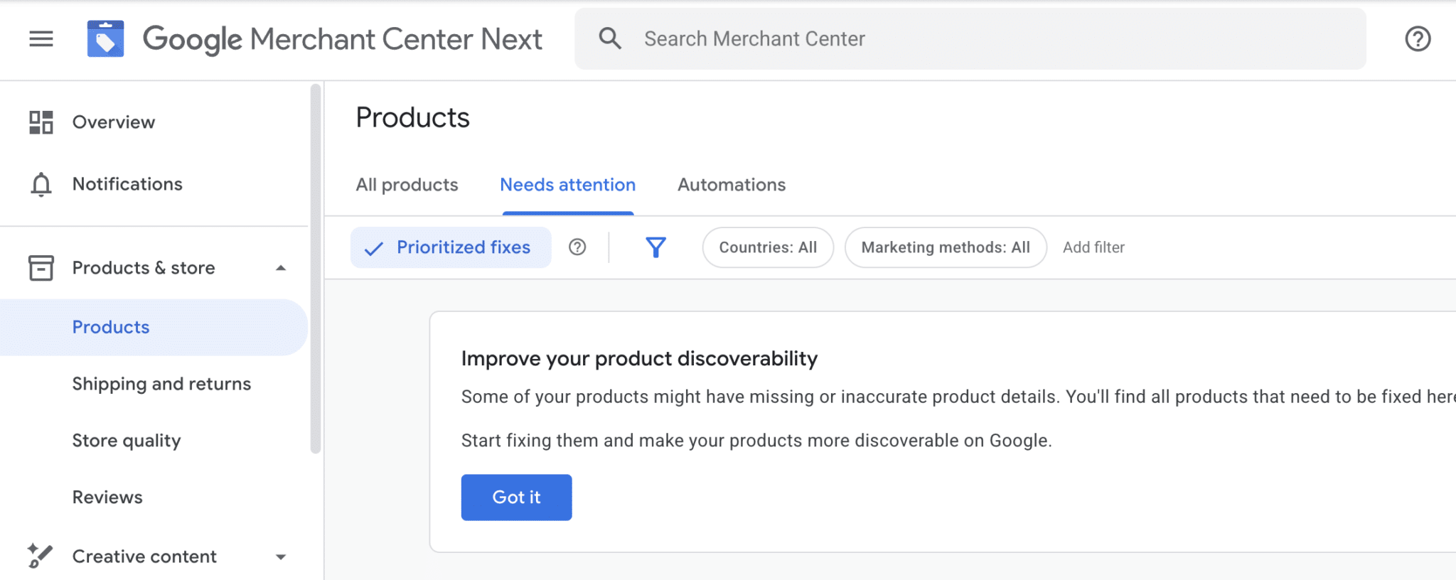 ```json
{
  "alt": "Google Merchant Center Next interface showing the Products section with a prompt to improve product discoverability.",
  "caption": "Navigate the Google Merchant Center Next interface to enhance your product discoverability. Address prioritized fixes to make your listings shine.",
  "description": "This image depicts the Google Merchant Center Next interface focused on the Products section, specifically under 'Needs attention.' A prompt advises on improving product discoverability by fixing errors in product details. Functional elements include options for prioritized fixes, filters for countries, and marketing methods. This tool helps improve the visibility and accuracy of product listings on Google."
}
```