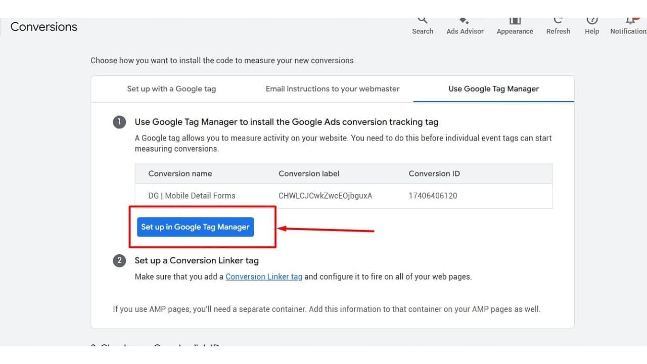 ```json
{
  "alt": "Google Tag Manager setup screen for conversion tracking.",
  "caption": "Streamline your marketing efforts with Google Tag Manager's conversion tracking setup, guiding you step-by-step through the process.",
  "description": "This image shows a screen from Google Tag Manager, guiding users on setting up conversion tracking tags for Google Ads. The screen highlights options to install the tracking tag, a table with conversion details, and a button labeled 'Set up in Google Tag Manager'. Essential for optimizing website activity measurement and enhancing advertising effectiveness."
}
```