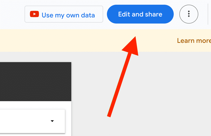 ```json
{
  "alt": "Close-up of online interface with 'Edit and share' button highlighted by red arrow.",
  "caption": "Navigate your online platform with ease by using the highlighted 'Edit and share' button.",
  "description": "This image shows a portion of a digital interface, focusing on a blue 'Edit and share' button at the top right, highlighted by a red arrow. The environment suggests a web-based platform, with a section of a dropdown menu visible. The image is useful for illustrating tech tutorials and guides, emphasizing user interaction features. Keywords: online interface, button, edit, share, navigation."
}
```