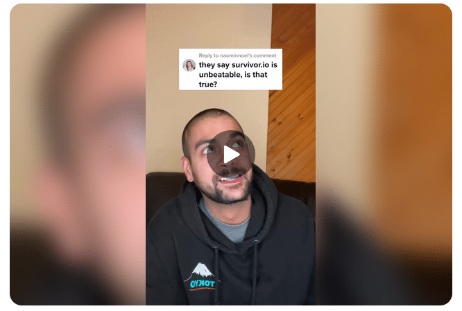 ```json
{
  "alt": "Man in a black hoodie answers a question about the game Survivor.io",
  "caption": "Exploring the unbeatable myth of Survivor.io, this video provides insights and tips.",
  "description": "A man in a black hoodie, marked with a logo, responds to a comment asking if Survivor.io is unbeatable. The background shows a two-toned wall with wood paneling. The video aims to address a common inquiry among players, sharing personal experiences and strategies related to the game. Keywords: Survivor.io, unbeatable, gaming tips, strategy."
}
```