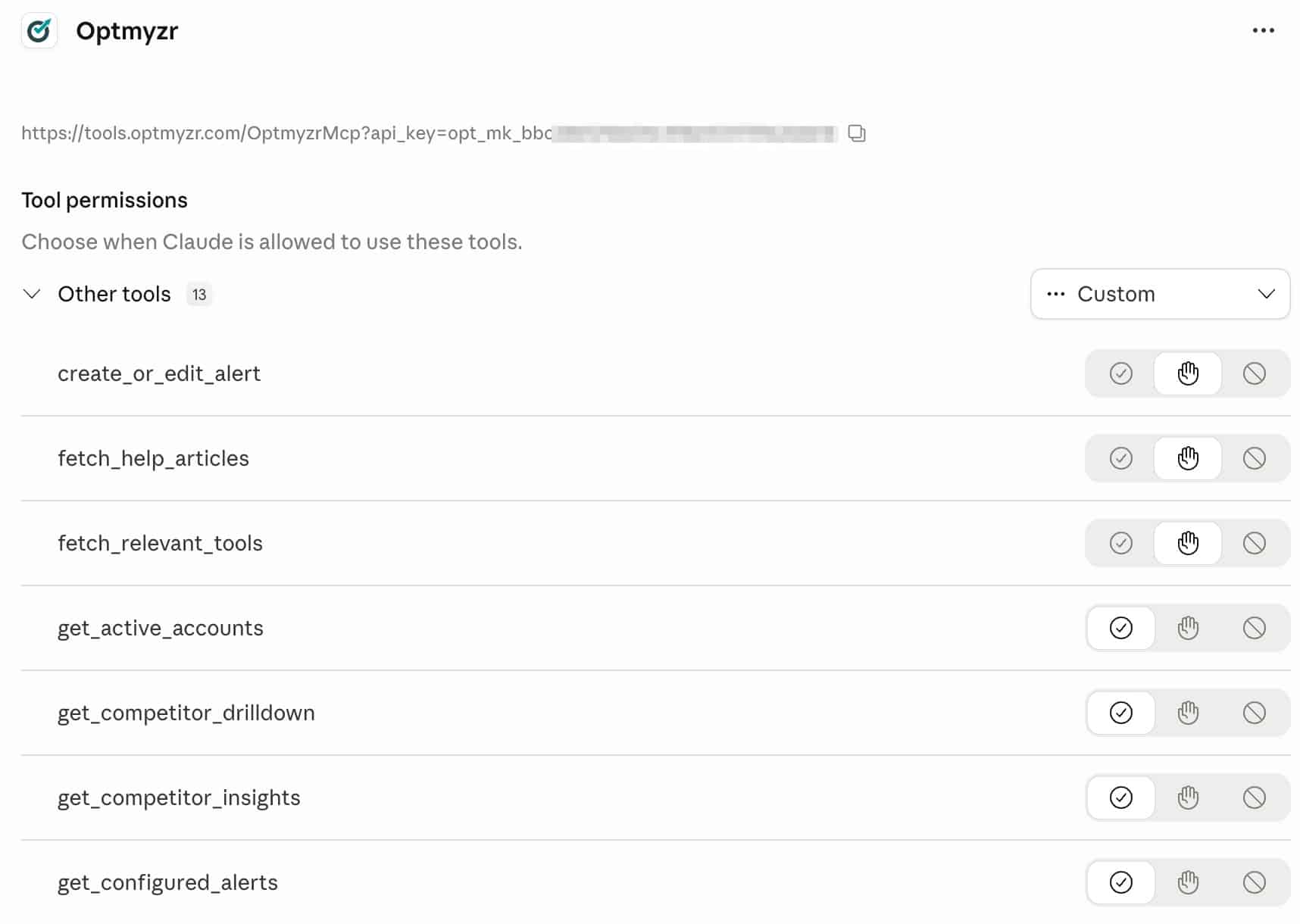 ```json
{
  "alt": "Screenshot of Optmyzr tool permissions interface showing API key and access toggles for various tools.",
  "caption": "Exploring the Optmyzr tool permissions interface, where users can manage API access and configure tool usage with ease.",
  "description": "This screenshot displays the Optmyzr tool permissions section, featuring an API key and customizable toggles for different tools like 'create_or_edit_alert' and 'fetch_help_articles'. The interface allows for detailed permission management, ensuring users can control access to tools effectively. Keywords: Optmyzr, tool permissions, API key, interface, access management."
}
```