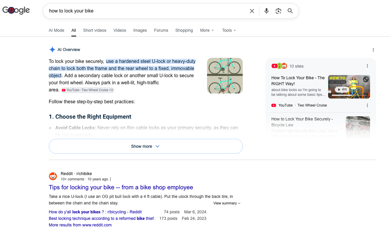 Google results for "how to lock your bike" showing an AI Overview, videos, and a Reddit result.